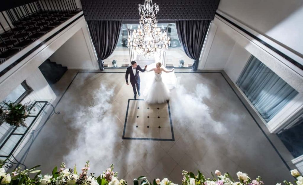 wedding couple at reception entrance