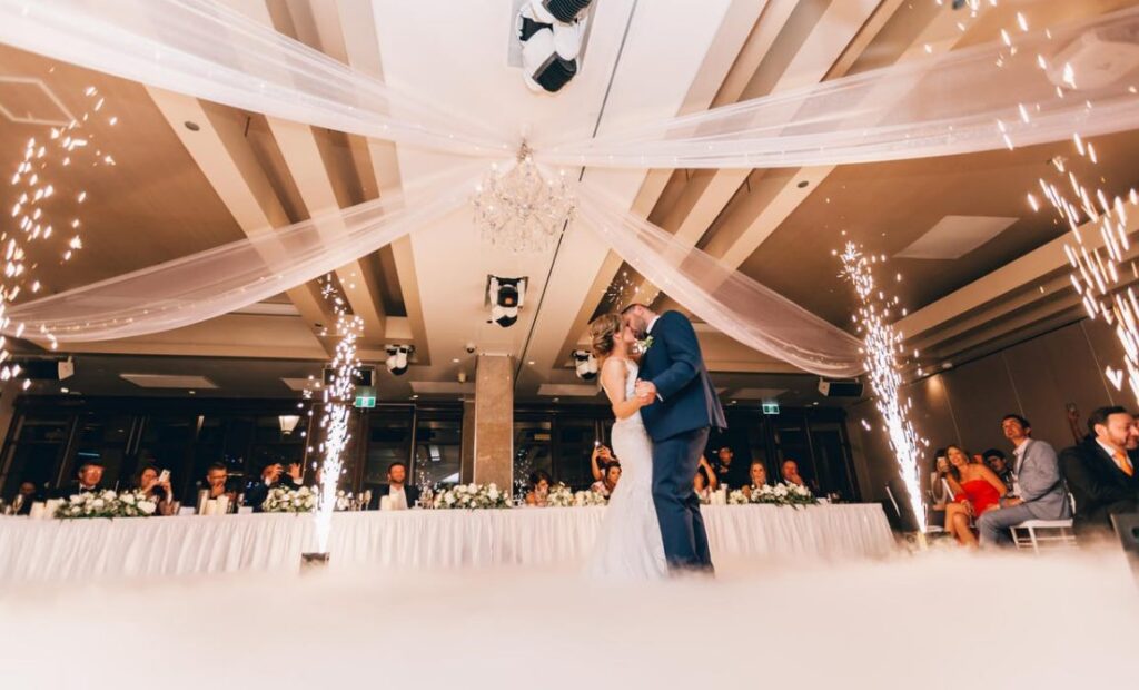 Low Angle Photography of Bride and Groom Dancing ·